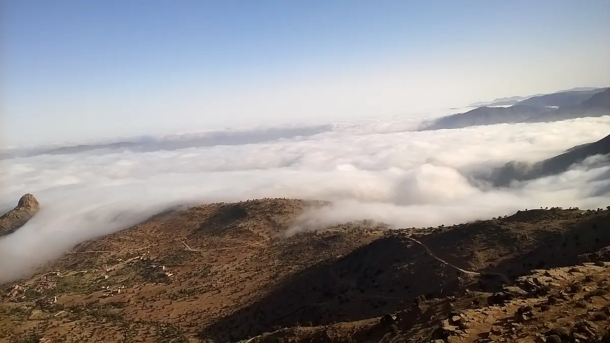 Low cloud filling the valleys between dry mountain ridges near Tiznit
